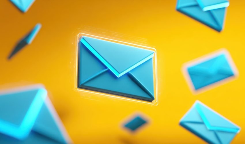 Blue digital envelopes appear to float against a bright yellow background symbolizing online communication messaging and quick information exchange in modern technology.